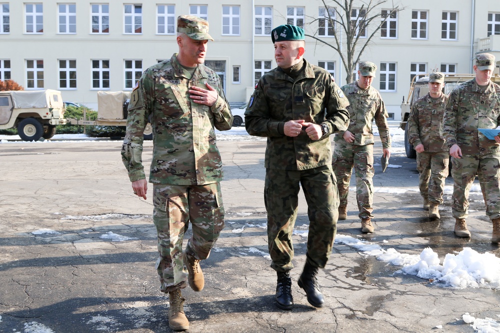 Col. Patrick Michaelis welcomes Major General Jaroslaw Gromadzinski to the Mission Command Element
