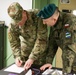 Col. Patrick Michaelis welcomes Major General Jaroslaw Gromadzinski to the Mission Command Element
