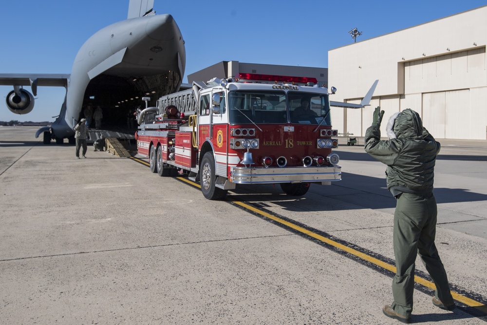 JBMDL Airmen load Fire Truck bound for Nicaragua