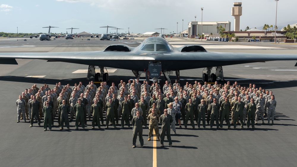 Over 200 Airmen pose for photo during Bomber Task Force mission