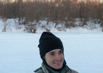 Guardsmen engage with western Alaskans during sled dog race