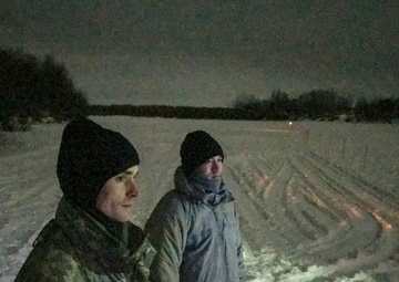 Guardsmen engage with western Alaskans during sled dog race