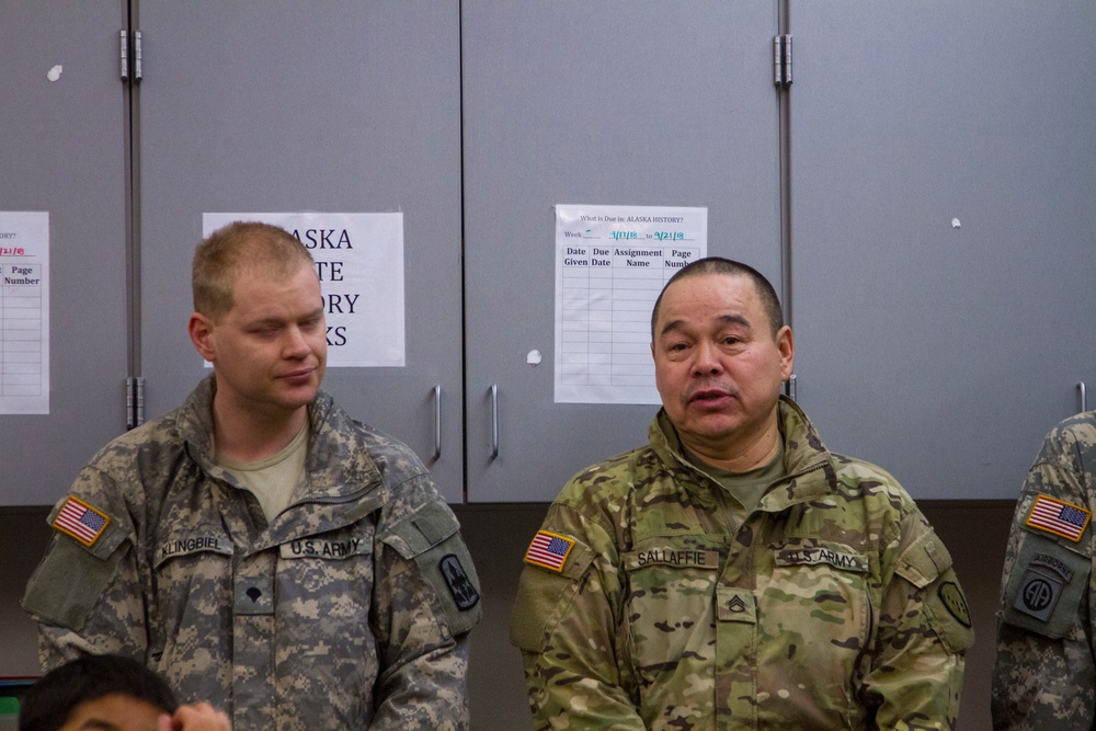 Guardsmen engage with western Alaskans during sled dog race