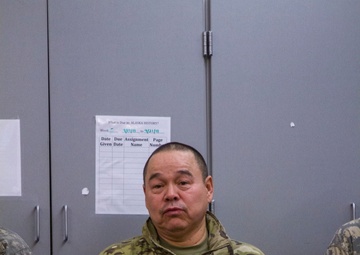 Guardsmen engage with western Alaskans during sled dog race