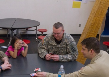 Guardsmen engage with western Alaskans during sled dog race