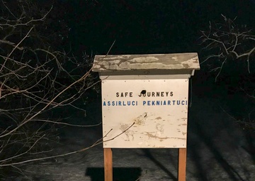 Guardsmen engage with western Alaskans during sled dog race