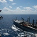 The aircraft carrier USS John C. Stennis (CVN 74) and the fleet replenishment oiler USNS Guadalupe (T-AO 200) conduct a replenishment-at-sea