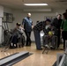 Michigan Adjutant General, Governor and Lt. Governor tour bowling alley at veterans home in Grand Rapids