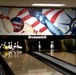Michigan Adjutant General, Governor and Lt. Governor tour bowling alley at veterans home in Grand Rapids