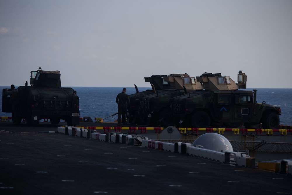 Weapons Company Marines defend the amphibious task force during gunnery exercise aboard Wasp