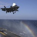 F-35B Lightning II fighters conduct flight operations at sea with external pylons