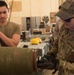 U.S Air Force Munitions crew invite Marines to build bombs in support of OIR
