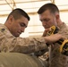 U.S Air Force Munitions crew invite Marines to build bombs in support of OIR