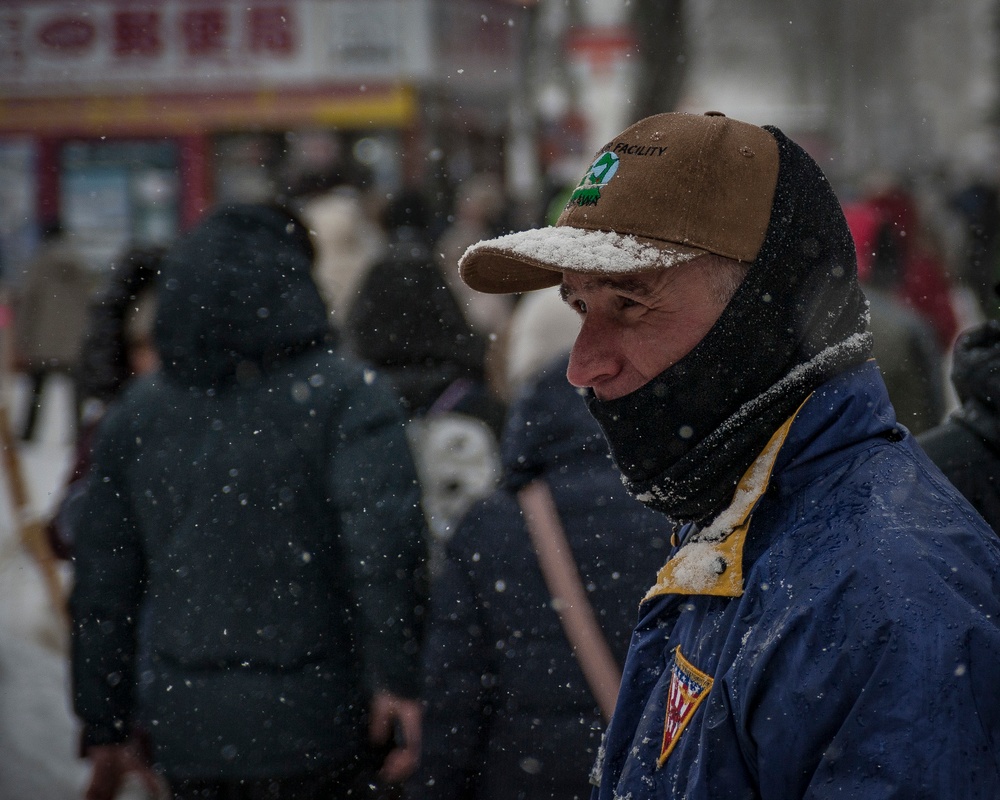 Chief stands watch during snow festival