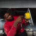 U.S. Sailor conducts maintenance