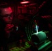 U.S. Sailor conducts a magnetic particle inspection