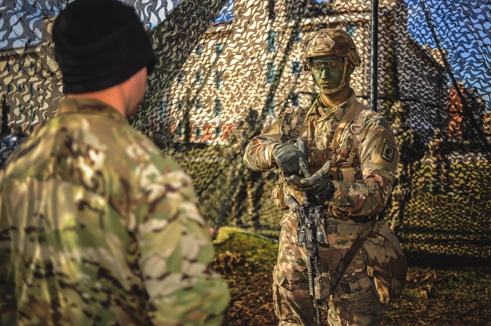 Paratrooper gives signal during test