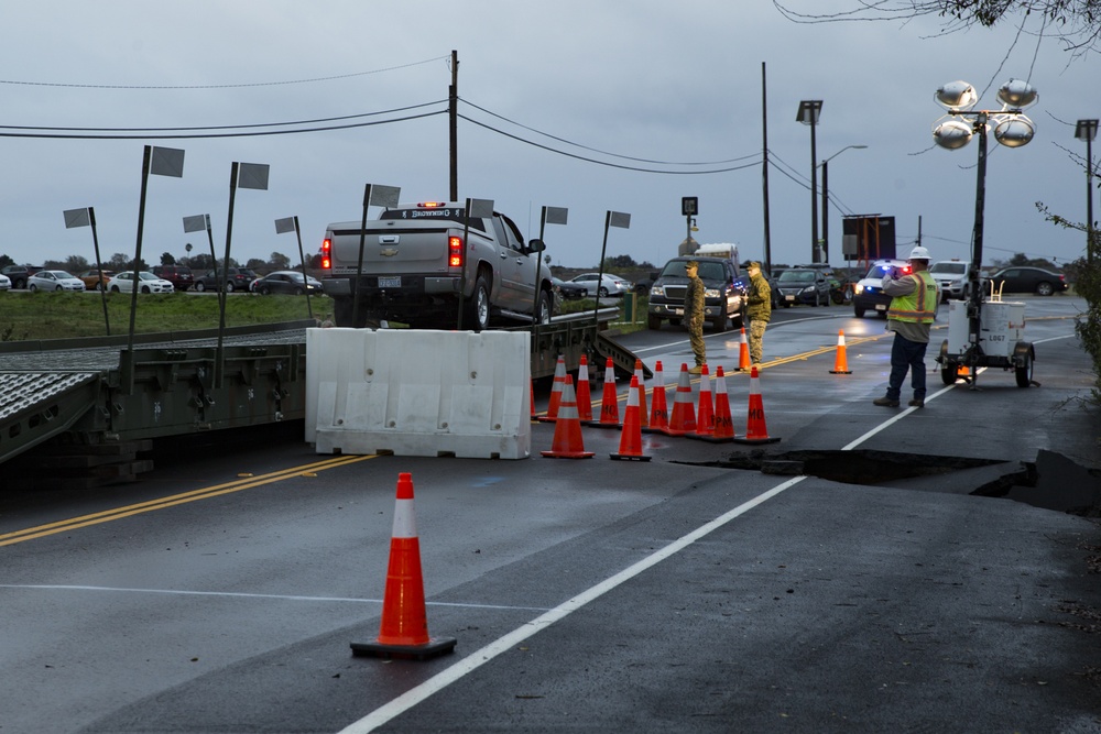 Building Bridges: U.S. Marines and contractors assess the safety and durability of a medium girder bridge