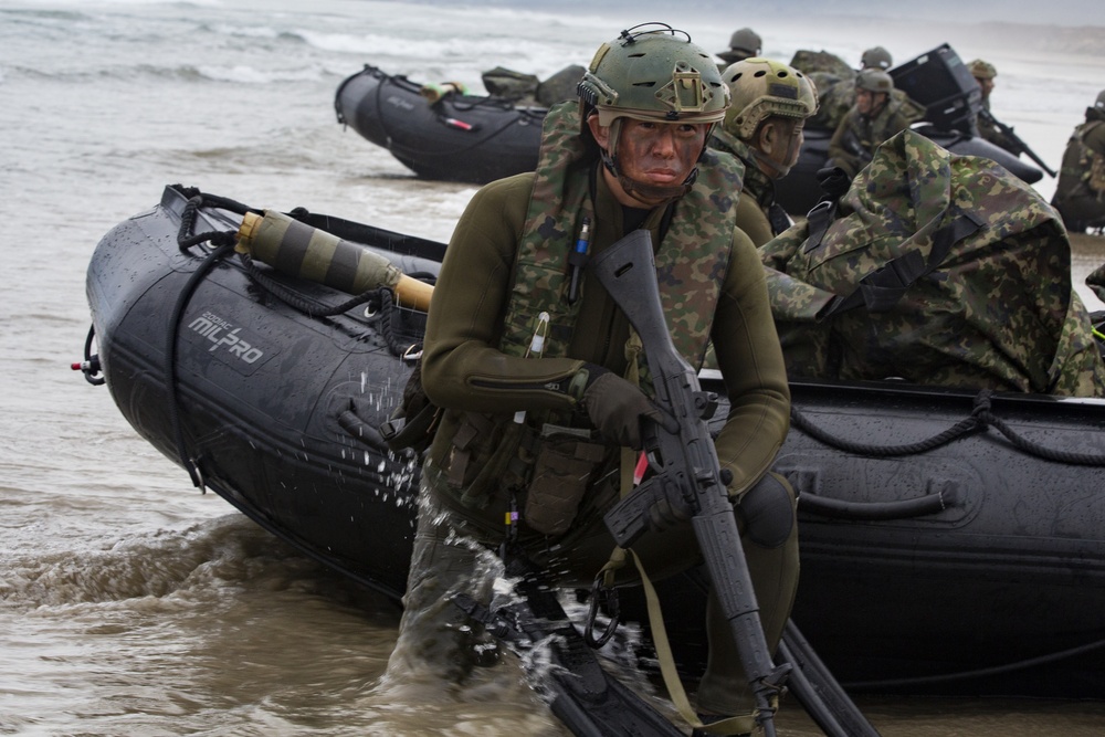 Japan Ground Self-Defense Force Soldiers perform surf passage in combat rubber raiding crafts after Helocasting during Iron Fist 2019