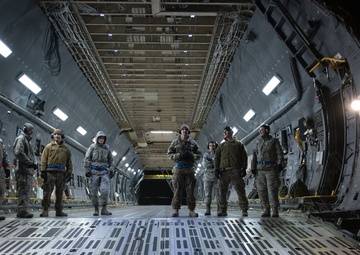 Port Dawgs load MH-65D Dolphin helicopter