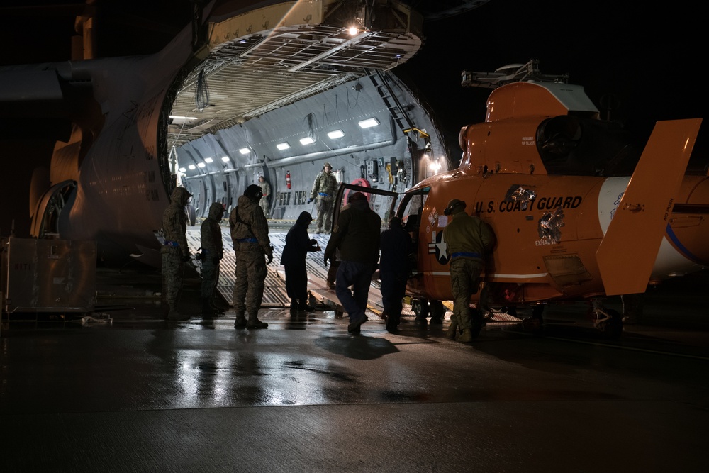 Port Dawgs load MH-65D Dolphin helicopter