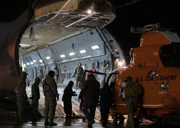 Port Dawgs load MH-65D Dolphin helicopter