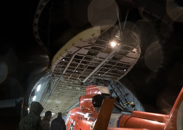Port Dawgs load MH-65D Dolphin helicopter