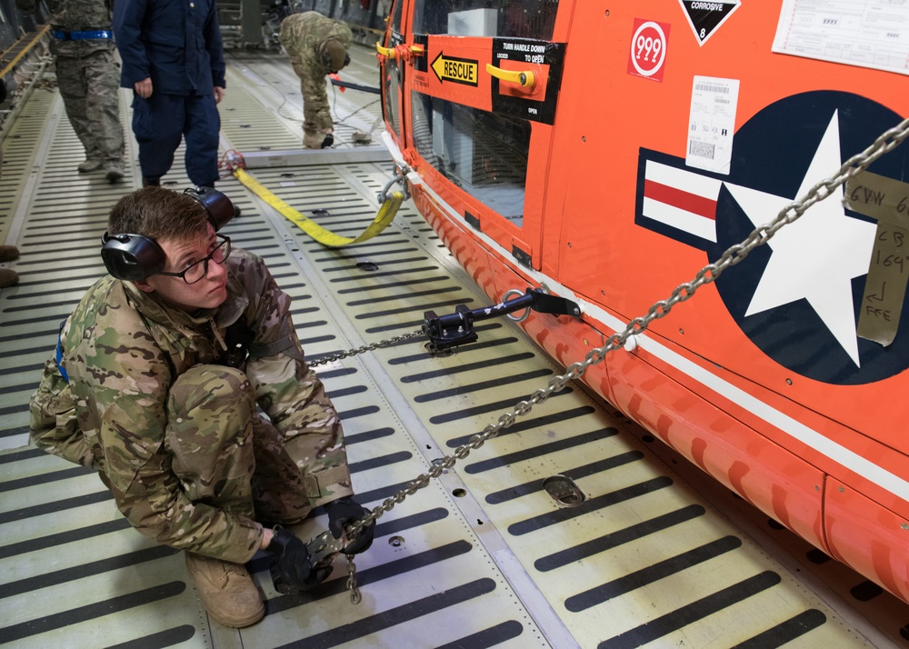 Port Dawgs load MH-65D Dolphin helicopter