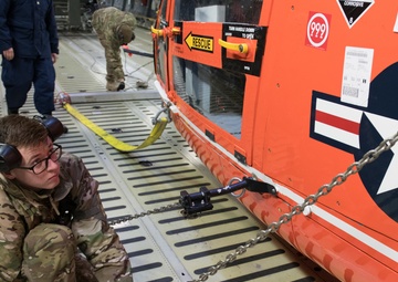 Port Dawgs load MH-65D Dolphin helicopter