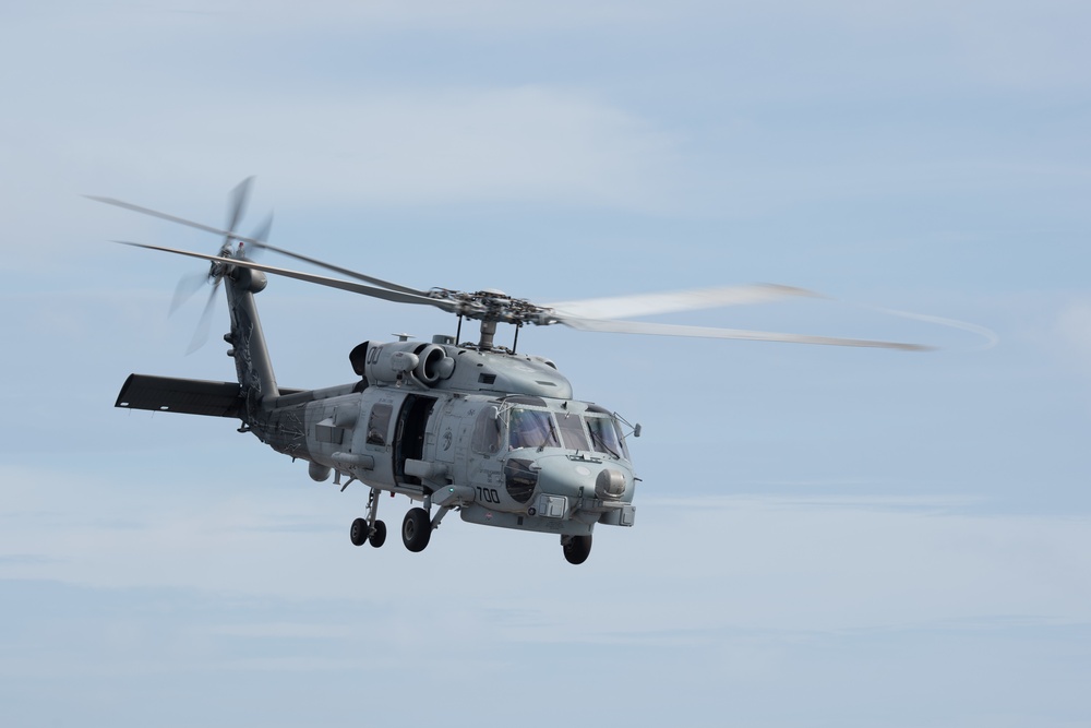 An MH-60R Sea Hawk takes off from the flight deck