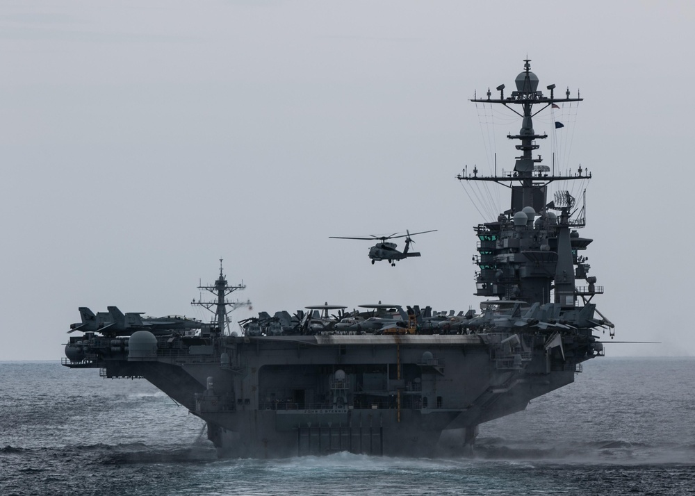 An MH-60R Sea Hawk prepares to land on USS John. C. Stennis