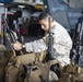 Sgt. Jorge Flores inspects an M4A1 carbine