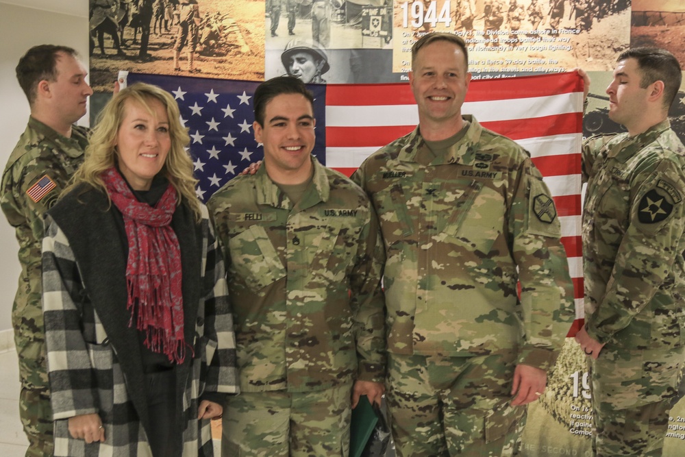 Reenlistment unites two generations of Army