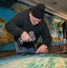 Cold War-era wall mural comes down