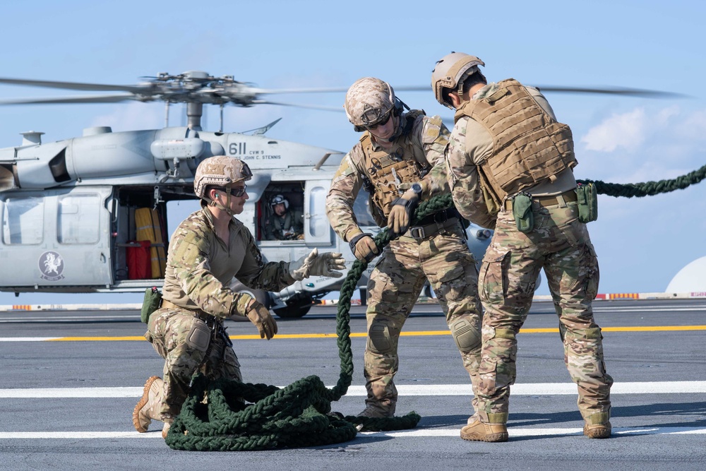 U.S. Sailors conduct fast rope exercise