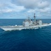 The guided-missile cruise USS Mobile Bay (CG 53) transits through the Pacific Ocean