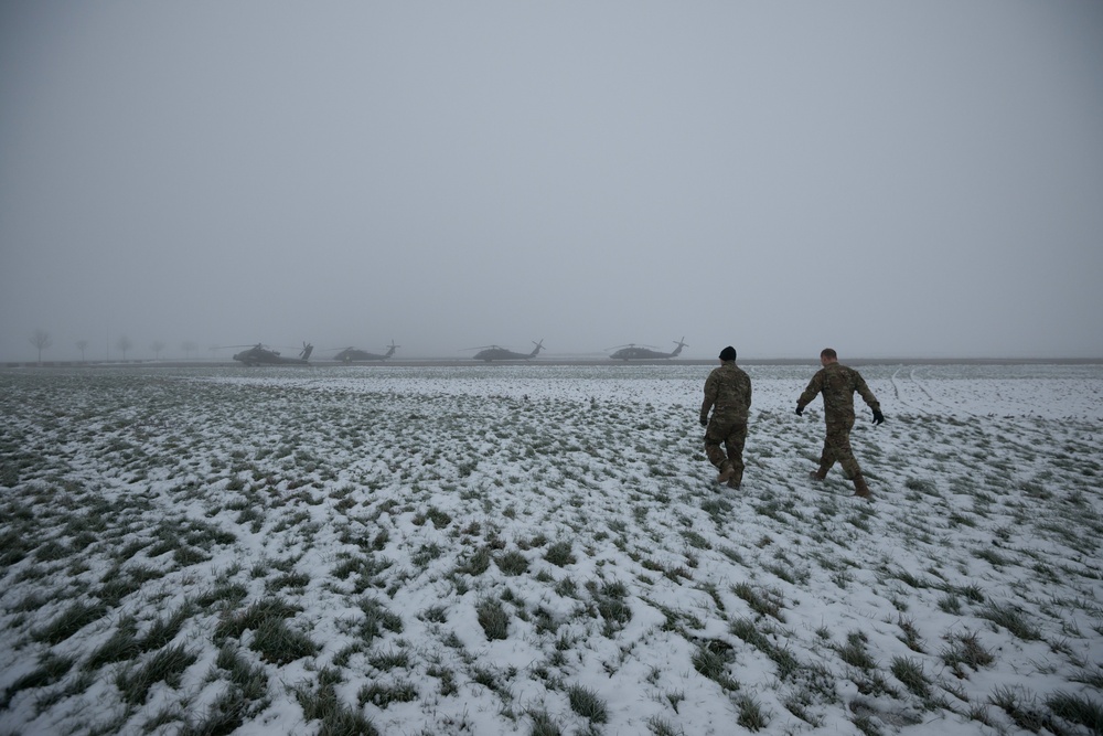 40-hour maintenance on 1CAB 1ID UH-60 Black Hawk in cold weather