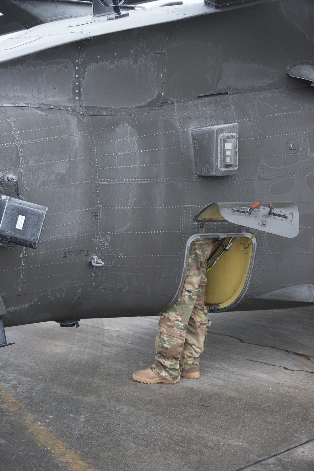 40-hour maintenance on 1CAB 1ID UH-60 Black Hawk in cold weather