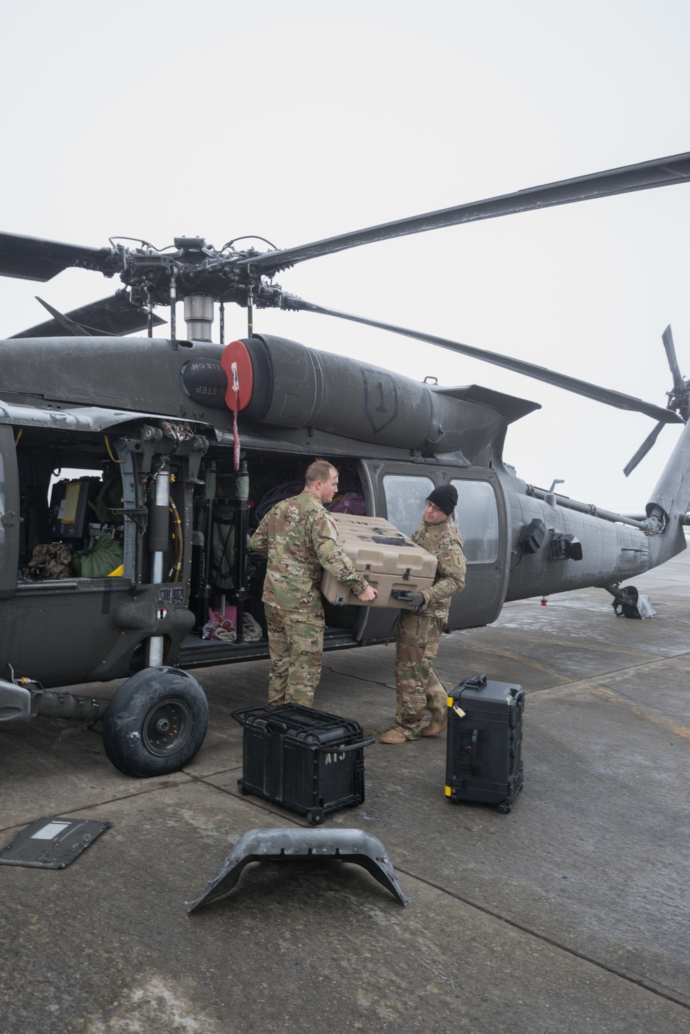 40-hour maintenance on 1CAB 1ID UH-60 Black Hawk in cold weather