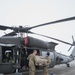 40-hour maintenance on 1CAB 1ID UH-60 Black Hawk in cold weather