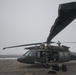 40-hour maintenance on 1CAB 1ID UH-60 Black Hawk in cold weather