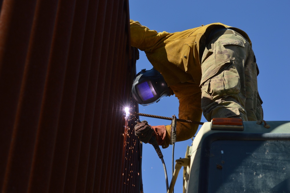 Engineers and MPs harden border wall in Sasabe