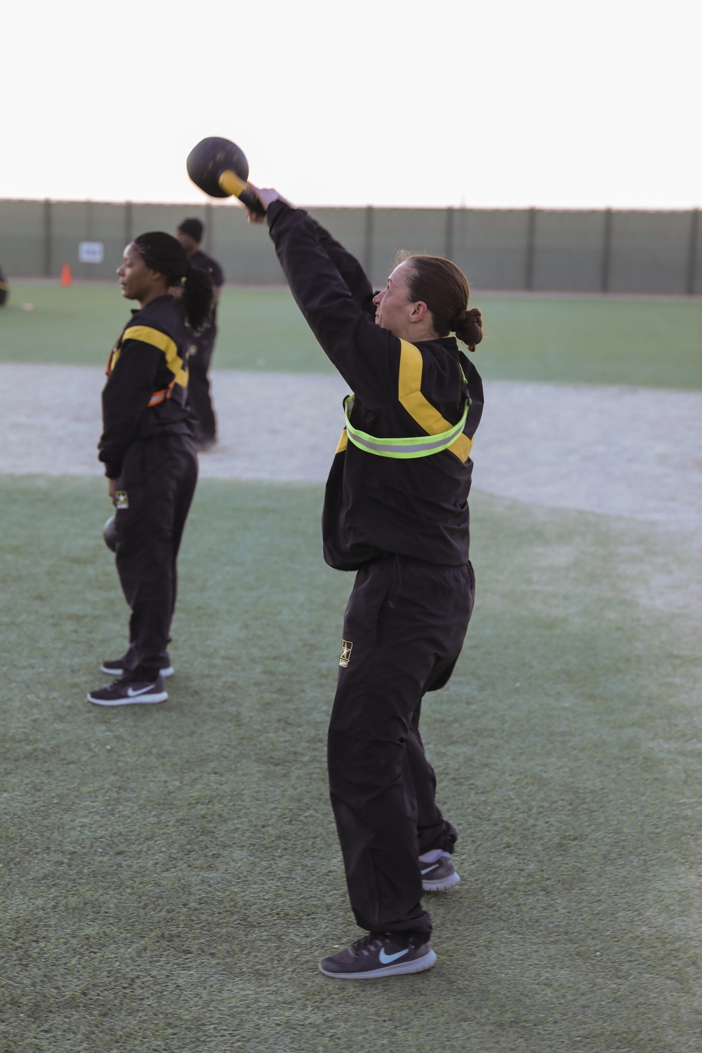 USARCENT Soldiers participate in a physical readiness training (PRT) session in honor of Soldiers