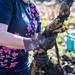 Learning the roots: station residents dig lotus roots