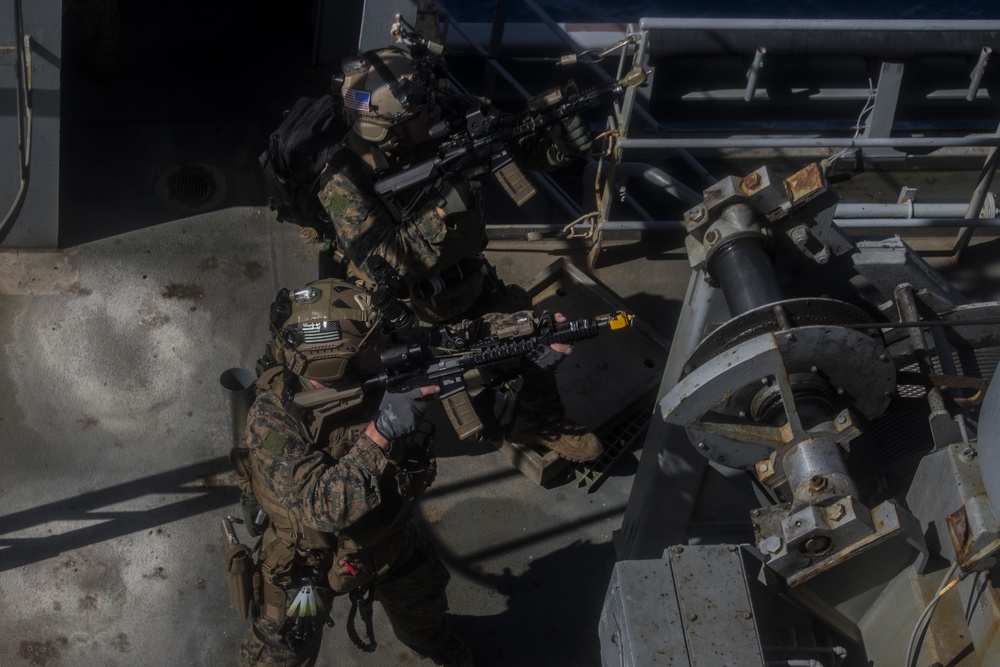 Marines board and secure vessel at sea during VBSS exercise
