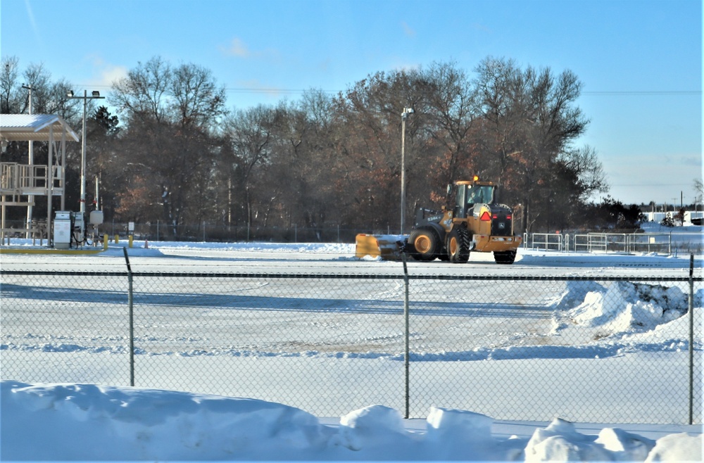 Contractors clear snow at Fort McCoy after late January snow