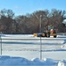 Contractors clear snow at Fort McCoy after late January snow