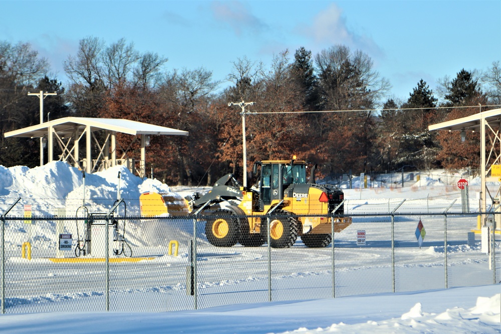 Contractors clear snow at Fort McCoy after late January snow
