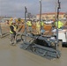 Laser-guided concrete screed machine