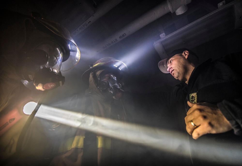 Firefighting training aboard USS Porter (DDG 78)